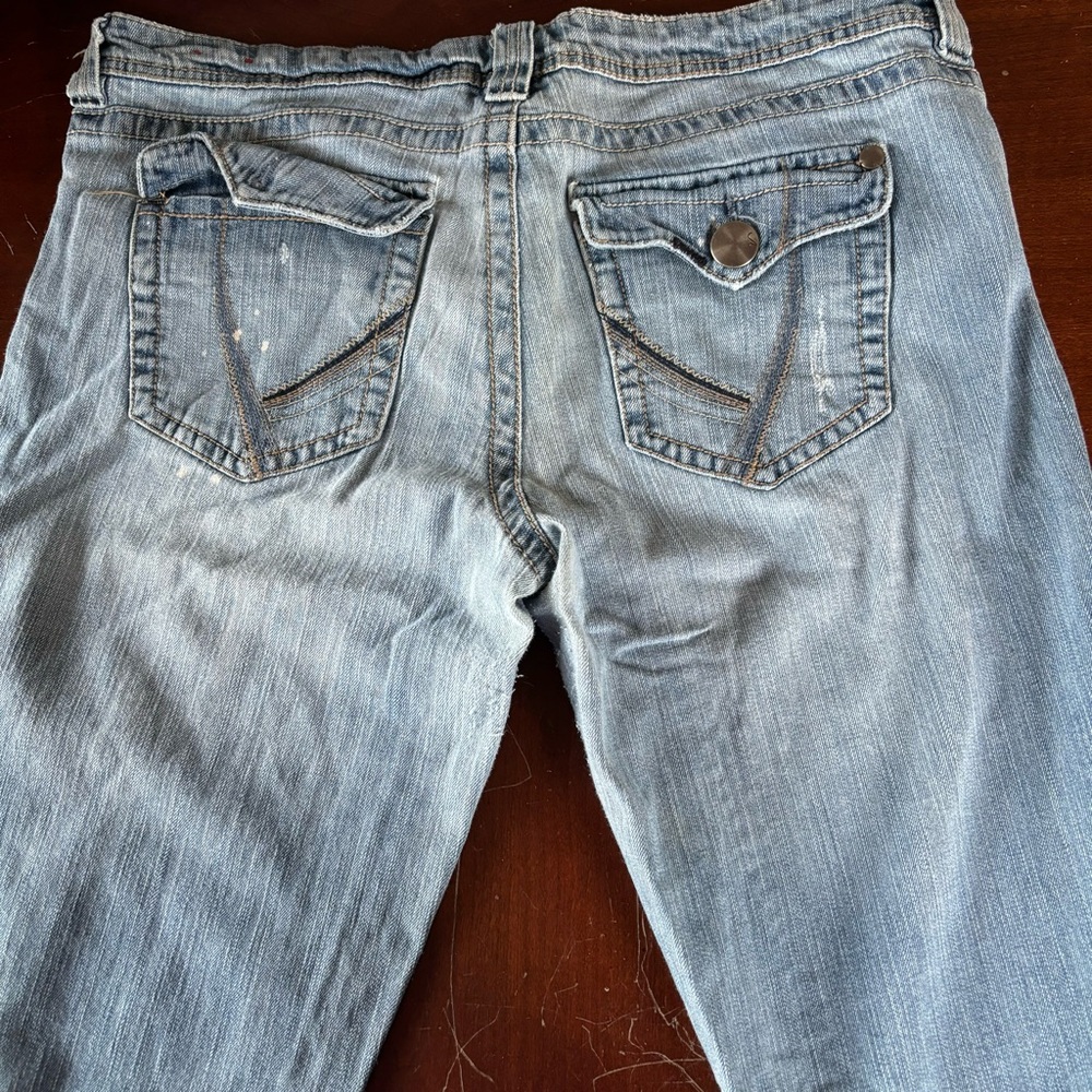 Vanity jeans missing button on back pocket